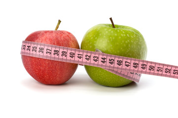 Apple with tape measure. Healthy lifestyle concept.