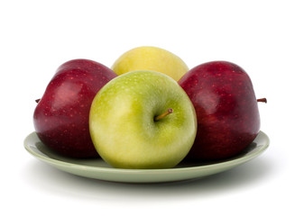 Apples pile on plate
