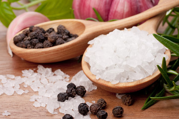 Fresh herbs and salt spoon