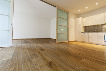 interior empty house with wooden floor, kitchen