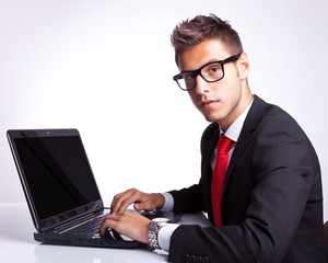 Business man Seated at Computer