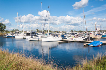 Modern marina with moored boats at the jetty
