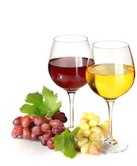 glasses of wine and ripe grapes isolated on white