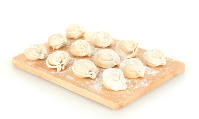 Raw Dumplings on cutting board isolated on white