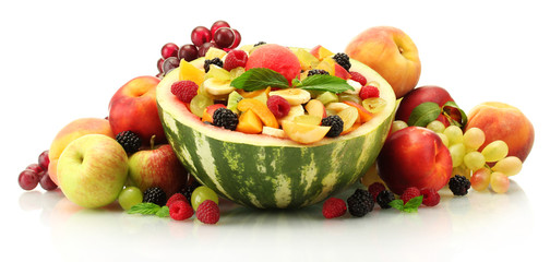 fresh fruits salad in watermelon, fruits and berries, isolated