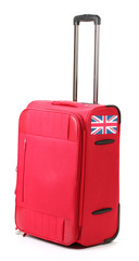 red suitcase with sticker with flag of United Kingdom isolated