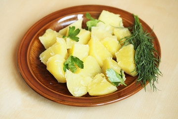 Boiled potatoes and greens