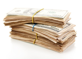 Stack of one hundred dollars banknotes close-up isolated