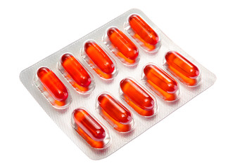 Capsules packed in blister isolated on white