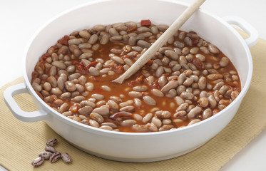 pan with beans on white background