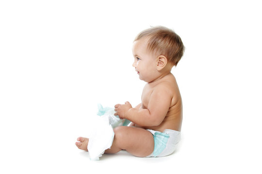 cute smiling baby with diapers isolated over white