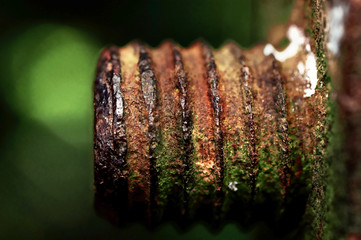 The rusted old iron nut which can't be turned off