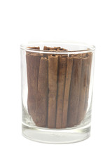 Cinnamon in the Glass Isolated on White Background