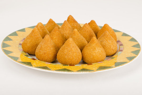 Coxinha: Brazilian deep fried snack filled with shredded chicken