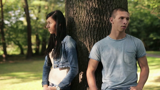 Relationship difficulties, couple in the park