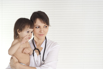 nice nurse with little girl