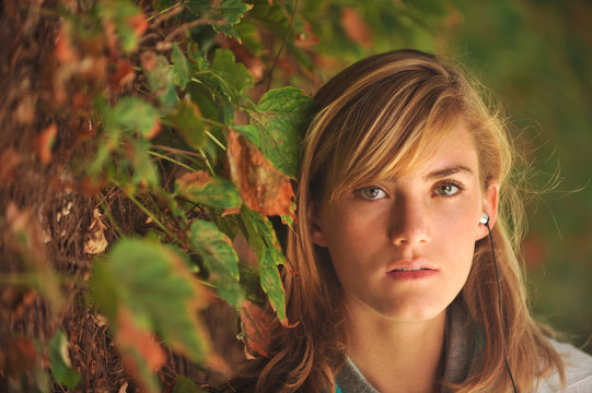 Young beautiful female student on campus