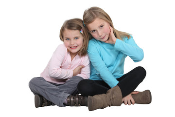 two little girls posing together © auremar