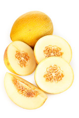 Cut ripe melons isolated on white