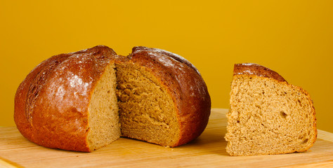 sliced bread on brown background close-up