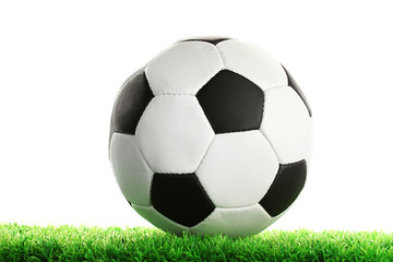 Fototapeta na wymiar football ball on green grass, isolated on white