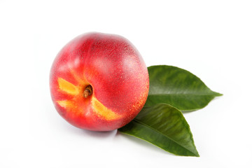 Fresh nectarin isolated on a white background.