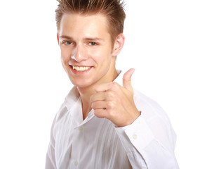 A smiling man showing thumb up sign