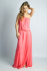 beautiful girl in rose long year peasant woman's dress