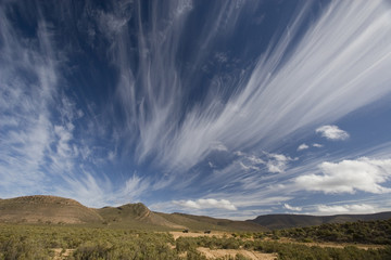 Spectacular clouds over the landscape, Aquila, South Africa