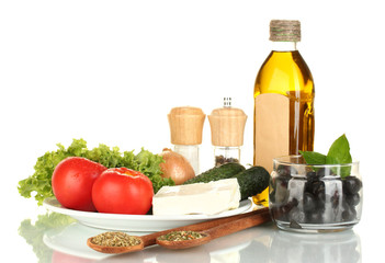Ingredients for a Greek salad isolated on white background