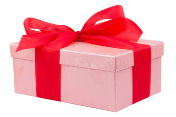 Single pink gift box with red ribbon on white background