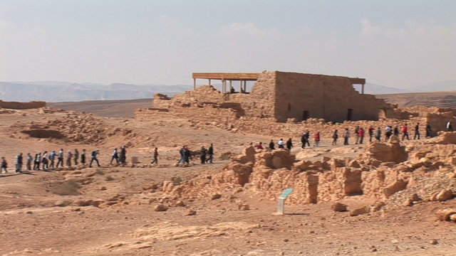 string of people in the fortress Masada
