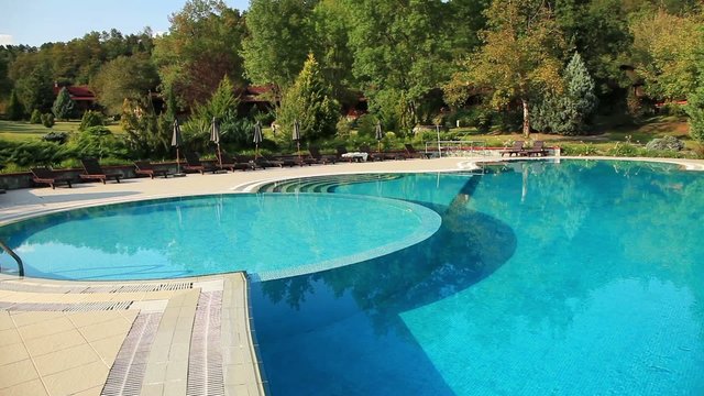 luxury village and pool, pan shoot