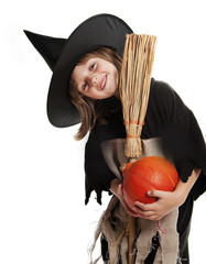 little girl with witch halloween mask