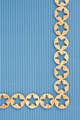 Button on bule paper background