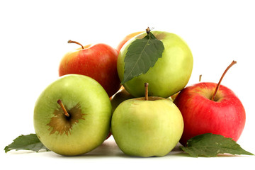 sweet apples with leaves, isolated on white