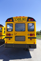Plakat Yellow School Bus With Blue Sky