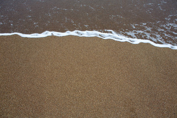 beach tropical with brown sand and clear water