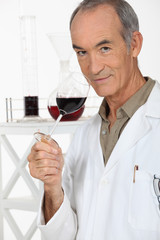 Winemaker tasting wine