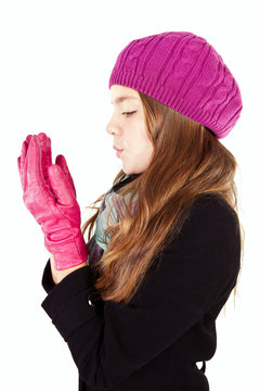 Girl Blow On Numb Hands Isolated Over White