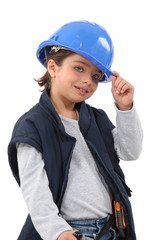 Little girl dressed as construction worker