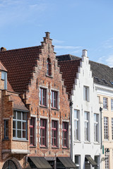 Fototapeta premium European small street with old brick houses. Bruges. Belgium.