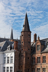 Fototapeta premium European small street with old brick houses. Bruges. Belgium.