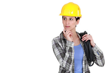Tradeswoman deep in thought
