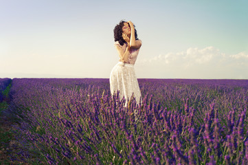 Romantic woman in fairy lavender fields