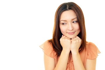 Fototapeta premium にっこりほほ笑み考え事をしているＯＬ