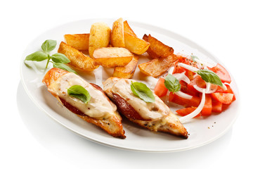 Grilled chicken breasts with cheese and baked potatoes