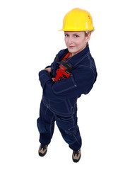 Woman holding a pipe wrench