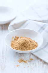 Ground ginger in a small bowl