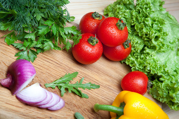 Fresh vegetables on cutting board.